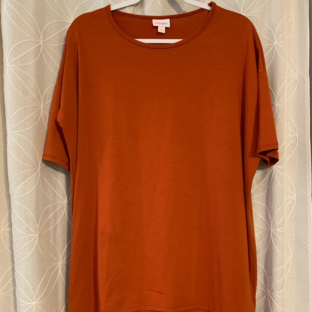 Lularoe top with flowy high low hem line.